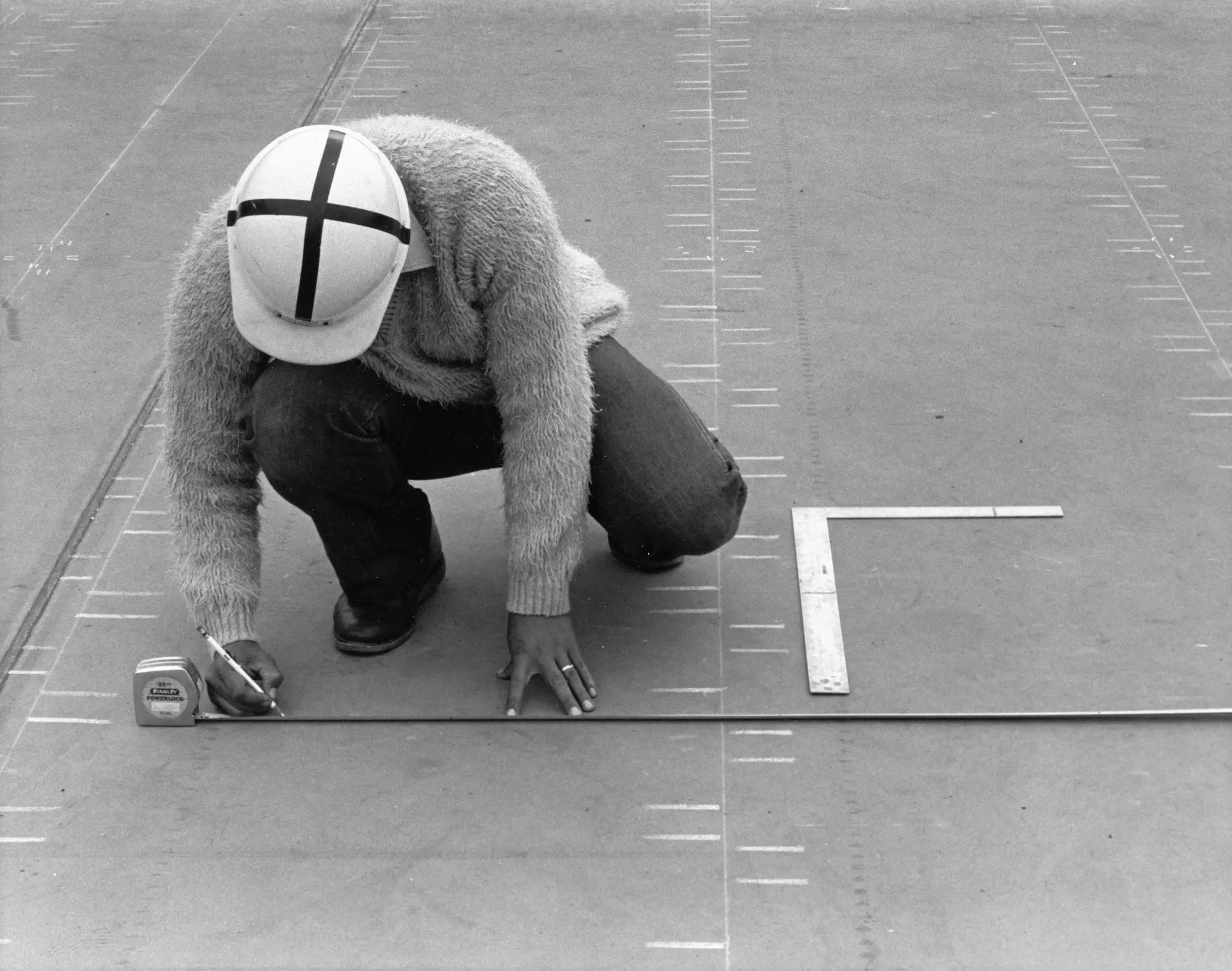 Building plans being reviewed at a residential project